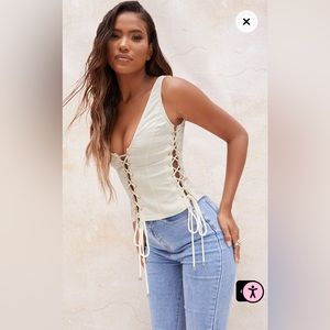 PrettyLittleThing Cream Woven Lace Up Detail Plunge Sleeveless Top